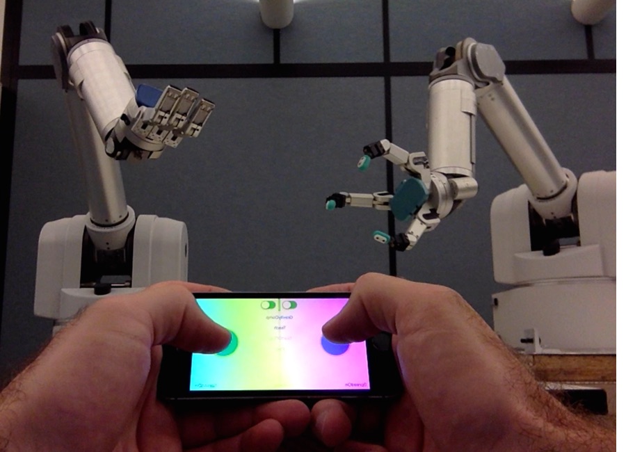 Two robot arms with dexterous hands controlled from an iPhone app